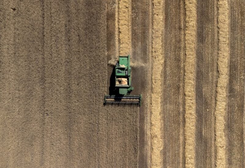 A combine harvests a wheat field, as Russia's attack on Ukraine continues, in Dnipropetrovsk region, Ukraine, July 30, 2022. REUTERS/Alkis Konstantinidis TPX IMAGES OF THE DAY