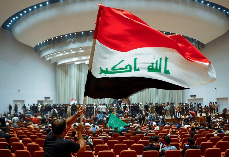 FILE PHOTO: Supporters of Iraqi Shi'ite cleric Moqtada al-Sadr protest against corruption, inside the parliament in Baghdad, Iraq July 30, 2022. To match Special Report IRAQ-IRAN/SHIITES REUTERS/Thaier Al-Sudani/File Photo