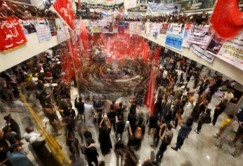 Supporters of Iraqi populist leader Muqtada al-Sadr gather during a sit-in at the parliament building, amid political crisis in Baghdad, Iraq August 4, 2022. REUTERS/Alaa Al-Marjani TPX IMAGES OF THE DAY