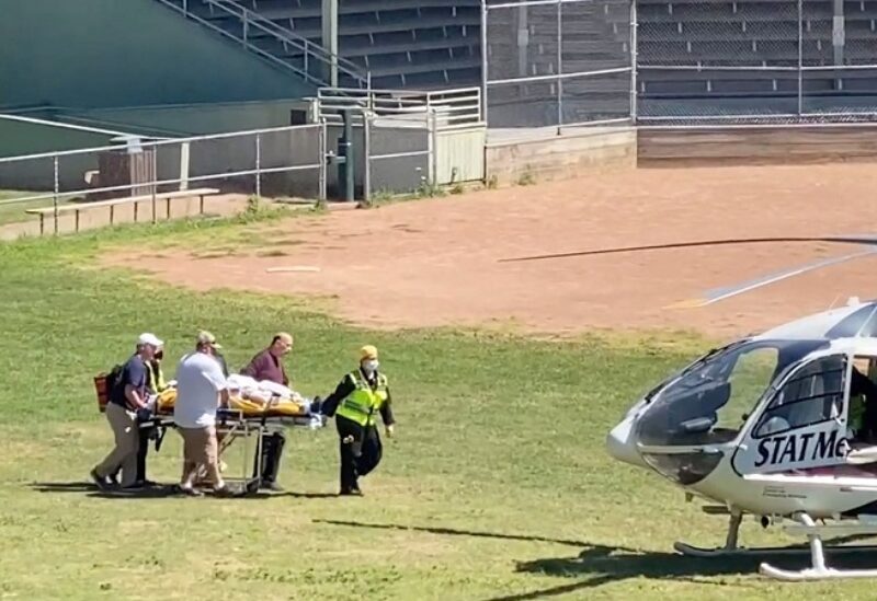 Author Salman Rushdie is transported to a helicopter after he was stabbed on stage before his scheduled speech at the Chautauqua Institution, Chautauqua, New York, U.S., August 12, 2022, in this screengrab taken from a social media video. TWITTER @HoratioGates3 /via REUTERS THIS IMAGE HAS BEEN SUPPLIED BY A THIRD PARTY. MANDATORY CREDIT.
