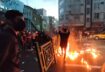 People light a fire during a protest over the death of Mahsa Amini, a woman who died after being arrested by the Islamic republic's "morality police", in Tehran, Iran September 21, 2022. WANA (West Asia News Agency) via REUTERS