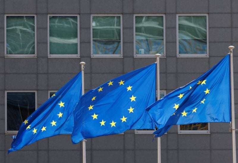 European Union flags flutter outside the EU Commission headquarters in Brussels, Belgium June 17, 2022. REUTERS/Yves Herman
