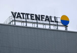 The company Logo hangs at the entrance of the combined heat and power plant, Reuter West, owned by Vattenfall GmbH during its final construction phase before being fully operational in Berlin, Germany June 30, 2022. REUTERS/Michele Tantussi/File Photo