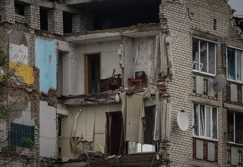 A damaged apartment building is seen, as Russia's attack on Ukraine continues, in the town of Izium, recently liberated by Ukrainian Armed Forces, in Kharkiv region, Ukraine September 14, 2022. REUTERS/Gleb Garanich