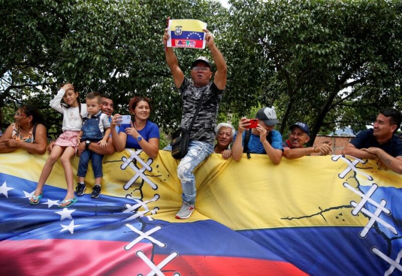 People attend the commercial reopening of Venezuela–Colombia border, at the Simon Bolivar International Bridge, in Cucuta, Colombia September 26, 2022. REUTERS/Leonardo Fernandez Viloria