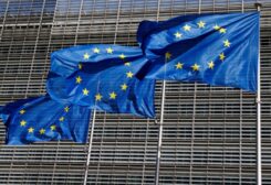 European Union flags flutter outside the EU Commission headquarters in Brussels, Belgium, June 17, 2022. REUTERS/Yves Herman/File Photo