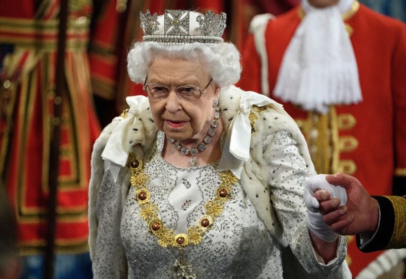 Britain's Queen Elizabeth proceeds through the Royal Gallery before the Queen's Speech during the State Opening of Parliament at the Palace of Westminster in London, Britain October 14, 2019. Leon Neal/Pool via REUTERS/File Photo