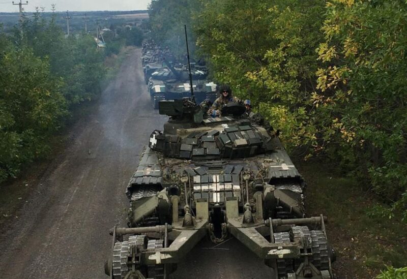 Ukrainian service members ride on tanks during a counteroffensive operation, amid Russia's attack on Ukraine, in Kharkiv region, Ukraine, in this handout picture released September 12, 2022. Press service of the General Staff of the Armed Forces of Ukraine/Handout via REUTERS