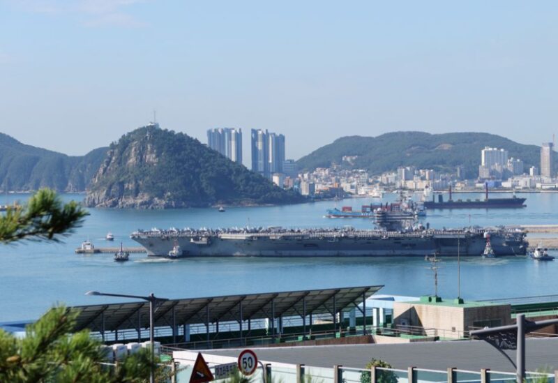 U.S. Navy aircraft carrier USS Ronald Reagan is anchored at a port in Busan, South Korea, September 23, 2022. REUTERS/Daewoung Kim