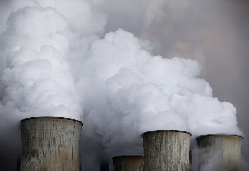 Steam rises from the cooling towers of the coal power plant of RWE, one of Europe's biggest electricity and gas companies in Niederaussem, Germany, March 3, 2016. REUTERS/Wolfgang Rattay//File Photo