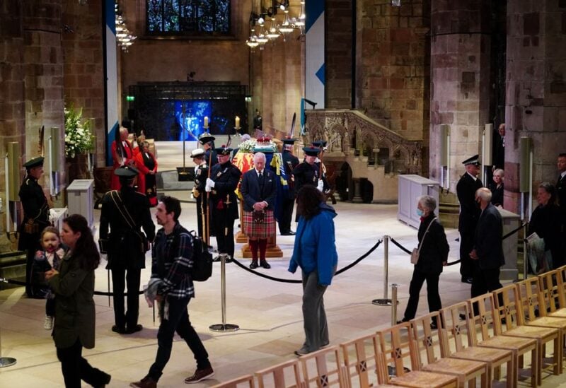 King Charles III and other members of the royal family hold a vigil at St Giles' Cathedral, Edinburgh, in honour of Queen Elizabeth II as members of the public walk past. Picture date: Monday September 12, 2022. Jane Barlow/Pool via REUTERS