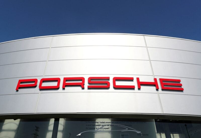 A logo of Porsche is seen outside a Porsche car dealer, amid the coronavirus disease (COVID-19) outbreak in Brussels, Belgium May 28, 2020. REUTERS/Yves Herman/File Photo
