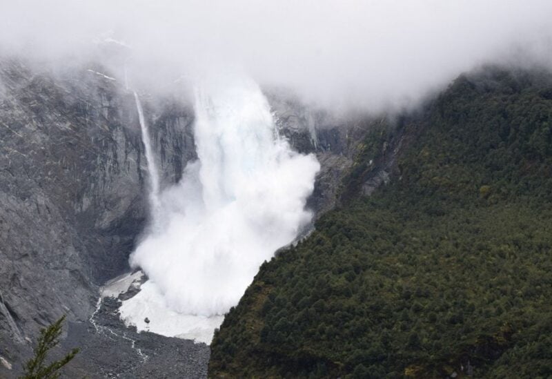 A glacier is pictured calving into the river, in Queulat National Park, in Aysen, Chile September 9, 2022