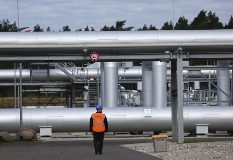 Security walks in front of the landfall facility of the Baltic Sea gas pipeline Nord Stream 2 in Lubmin, Germany, September 19, 2022. REUTERS/Fabrizio Bensch/File Photo