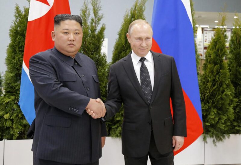 FILE - Russian President Vladimir Putin, right, and North Korea's leader Kim Jong Un shake hands during their meeting in Vladivostok, Russia, April 25, 2019. As the war in Ukraine stretches into its seventh month, North Korea is hinting at its interest in sending construction workers to help rebuild Russian-occupied territories in the country's east. (AP Photo/Alexander Zemlianichenko, Pool, File)