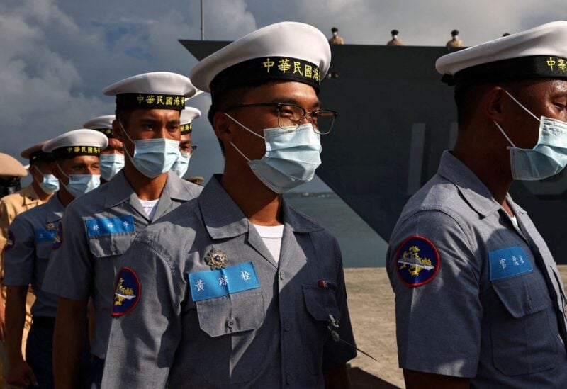 Members of the navy walk to position at a navy base in Penghu Islands, Taiwan, August 30, 2022. REUTERS/Ann Wang/File Photo