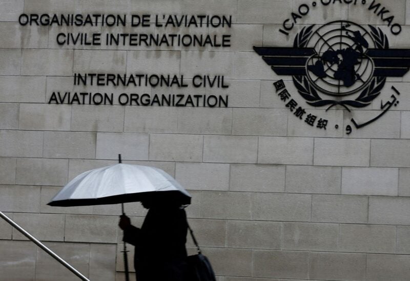 A pedestrian walks past the International Civil Aviation Organization (ICAO) headquarters building in Montreal, Quebec, Canada June 16, 2017. REUTERS/Christinne Muschi/File Photo