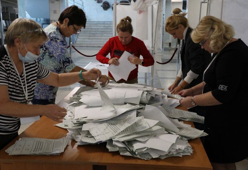Members of a local electoral commission count ballots at a polling station following a referendum on the joining of Russian-controlled regions of Ukraine to Russia, in Sevastopol, Crimea September 27, 2022.