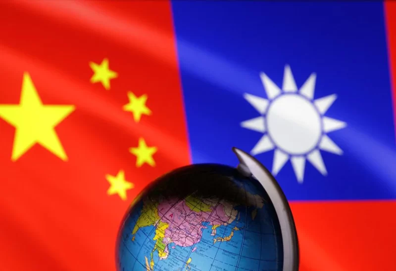 A globe is seen in front of Chinese and Taiwanese flags in this illustration, August 6, 2022. REUTERS
