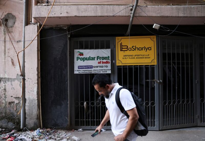 A man walks past the old office of Popular Front of India (PFI) Islamic group, in New Delhi, India, September 28, 2022. REUTERS/Anushree Fadnavis