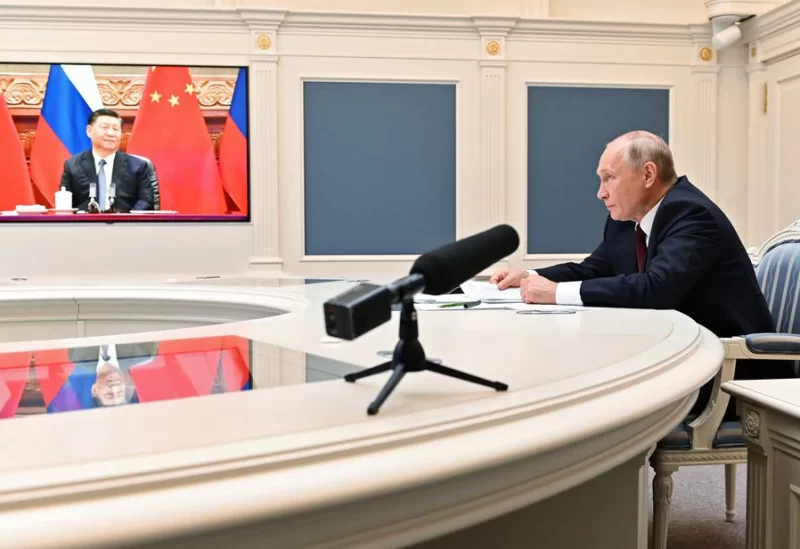 Russian President Vladimir Putin takes part in a video conference call with Chinese President Xi Jinping at the Kremlin in Moscow, Russia June 28, 202