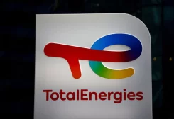 The logo of French oil and gas company TotalEnergies is pictured at an electric car charging station and petrol station at the financial and business district of La Defense in Courbevoie near Paris, France, June 22, 2021. REUTERS