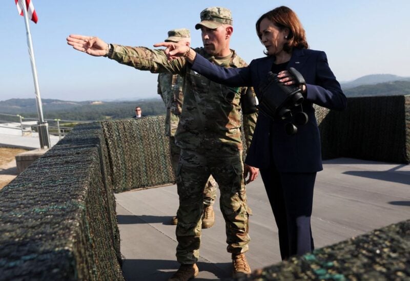 U.S. Vice President Kamala Harris uses binoculars at the military observation post as she visits the demilitarized zone (DMZ) separating the two Koreas, in Panmunjom, South Korea, September 29, 2022. REUTERS