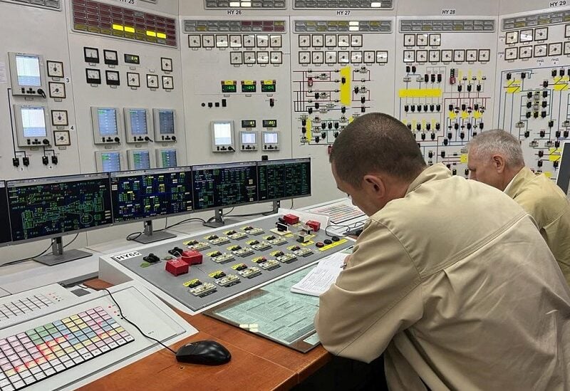 Employees work at the Russian-controlled Zaporizhzhia Nuclear Power Plant during a visit by members of the International Atomic Energy Agency (IAEA) expert mission, in the course of Ukraine-Russia conflict outside Enerhodar in the Zaporizhzhia region, Ukraine, in this picture released September 2, 2022. International Atomic Energy Agency (IAEA)/Handout via REUTERS THIS IMAGE HAS BEEN SUPPLIED BY A THIRD PARTY. MANDATORY CREDIT. NO RESALES. NO ARCHIVES.