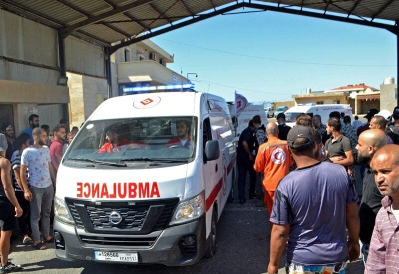 Red Cross cars transporting the bodies of the victims of the sinking boat in Tartous