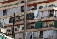 A picture of Lebanon's Prime Minister-designate Najib Mikati is placed on a residential building in the northern city of Tripoli, Lebanon September 23, 2022. REUTERS