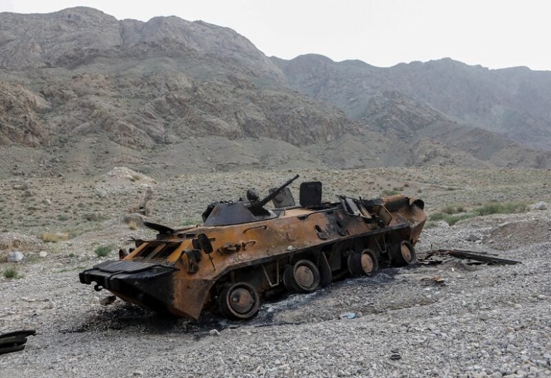 FILE PHOTO: A view shows a burnt armoured personnel carrier of Kyrgyz forces near Golovnoi water distribution facility outside the village of Kok-Tash in Batken province, Kyrgyzstan May 5, 2021. The clashes broke out last week along the frontier between Tajikistan's Sughd province and Kyrgyzstan's southern Batken province because of a dispute over a reservoir and pump, claimed by both sides, on the Isfara River. REUTERS/Vladimir Pirogov/File Photo