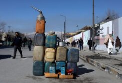 Cans containing gasoline are kept for sale on a road in Kabul, Afghanistan, January 27, 2022. REUTERS