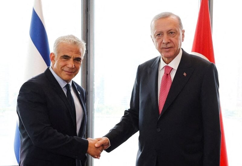 Turkish President Tayyip Erdogan meets with Israeli Prime Minister Yair Lapid on the sidelines of the U.N. General Assembly, in New York City, U.S., September 20, 2022. Presidential Press Office/Handout via REUTERS ATTENTION EDITORS - THIS PICTURE WAS PROVIDED BY A THIRD PARTY. NO RESALES. NO ARCHIVES. THIS PICTURE WAS PROCESSED BY REUTERS TO ENHANCE QUALITY. AN UNPROCESSED VERSION HAS BEEN PROVIDED SEPARATELY. TPX IMAGES OF THE DAY