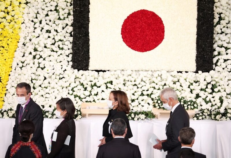 TOKYO, JAPAN - SEPTEMBER 27: U.S. Vice President, Kamala Harris, and U.S. Ambassador to Japan, Rahm Emanuel, pay their respects during the state funeral for Japan's former prime minister Shinzo Abe on September 27, 2022 at the Budokan in Tokyo, Japan. Several current and former heads of state visited Japan for the state funeral of Abe, who was assassinated in July while campaigning on a street. Takashi Aoyama/Pool via REUTERS