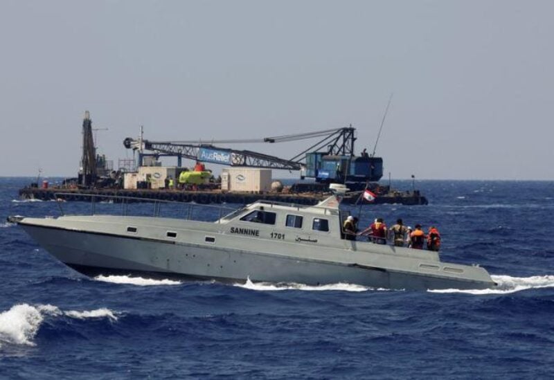 A Lebanese navy ship takes the family members of migrants missing since a boat sunk in April, on a tour of an area where a submarine was being prepared to search for the wreck of the boat off the Lebanese coast of Tripoli, Lebanon August 22, 2022. REUTERS/Mohamed Azakir