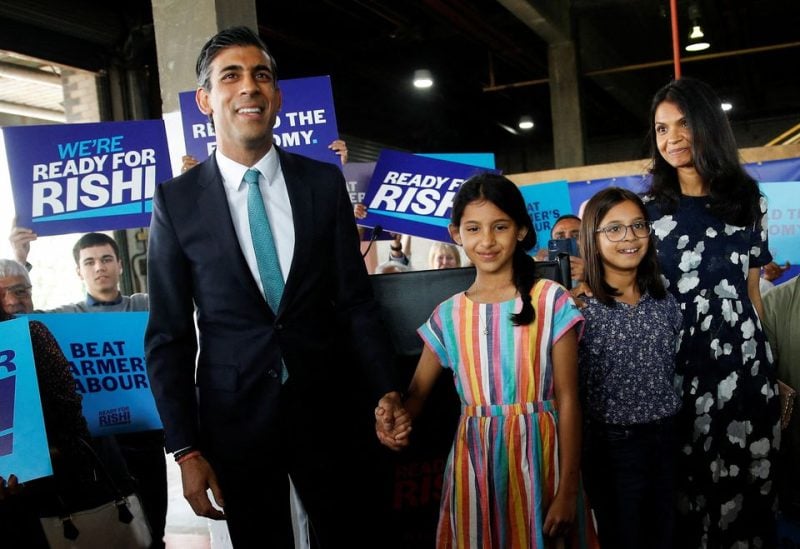 Rishi Sunak, his wife Akshata Murthy and his daughters Anoushka and Krishna attend a Conservative Party leadership campaign event in Grantham, Britain, July 23, 2022. REUTERS/Peter Nicholls/File Photo