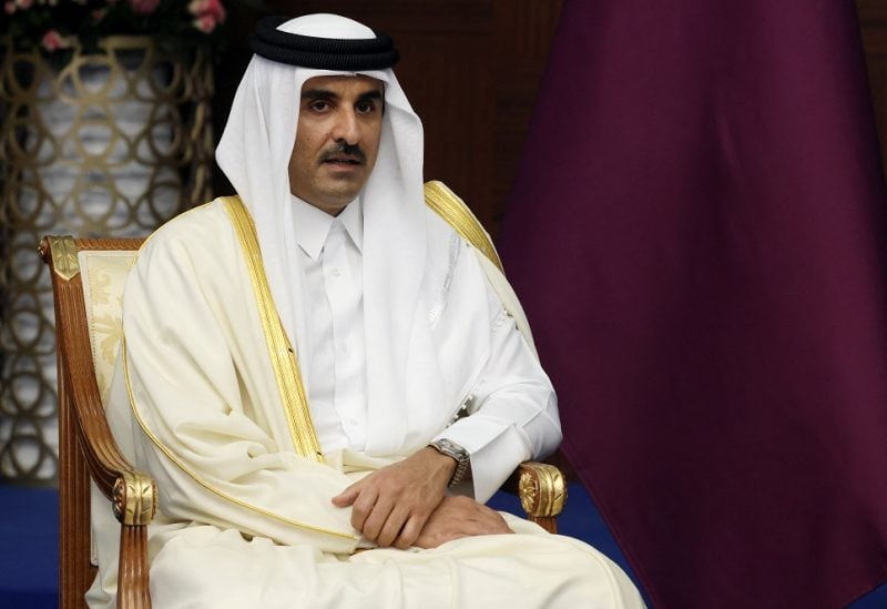 Qatar's Emir, Sheikh Tamim bin Hamad al-Thani attends a meeting with Russia's President Vladimir Putin on the sidelines of the 6th summit of the Conference on Interaction and Confidence-building Measures in Asia (CICA), in Astana, Kazakhstan October 13, 2022. Sputnik/Vyacheslav Prokofyev/Pool via REUTERS/File Photo