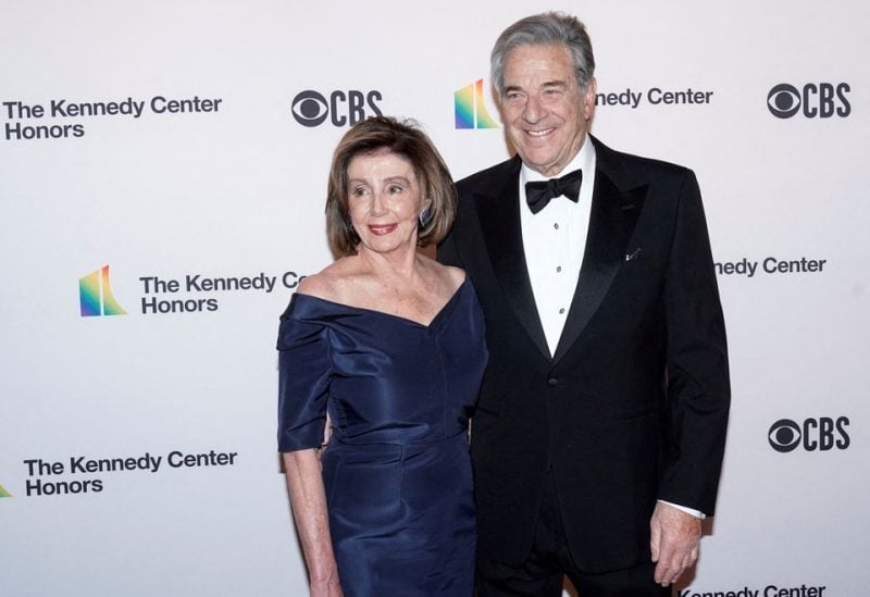 Speaker of the House Nancy Pelosi (D-CA) and her husband Paul Pelosi arrive for the 42nd Annual Kennedy Awards Honors in Washington, U.S., December 8, 2019. REUTERS/Joshua Roberts/File Photo