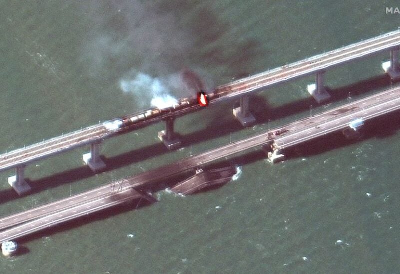 A satellite image shows a close up view of smoke rising from a fire on the Kerch bridge in the Kerch Strait, Crimea, October 8, 2022. Maxar Technologies/Handout via REUTERS