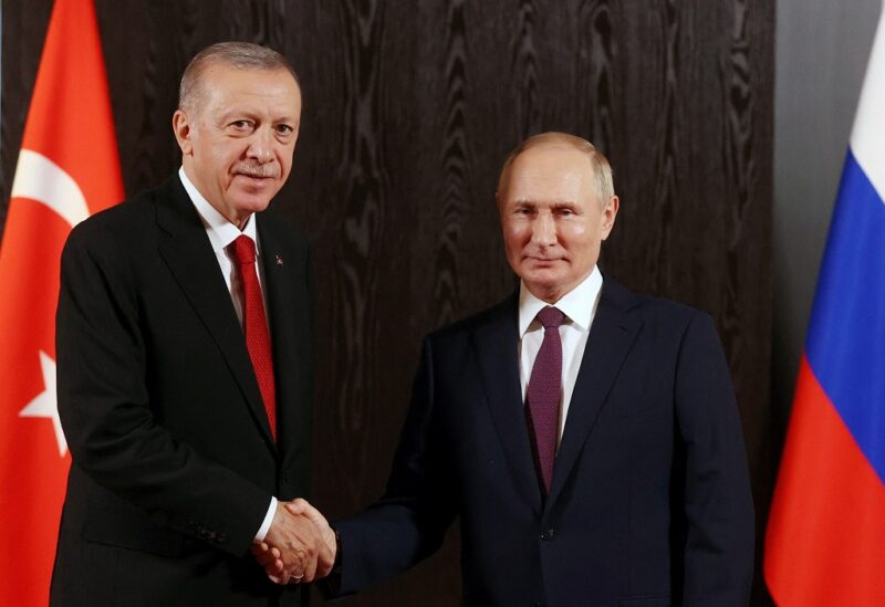 Russian President Vladimir Putin and Turkish President Tayyip Erdogan shake hands during a meeting on the sidelines of the Shanghai Cooperation Organization (SCO) summit in Samarkand, Uzbekistan September 16, 2022. Sputnik/Alexander Demyanchuk/Pool via REUTERS