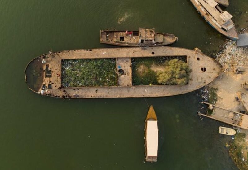 An aerial picture shows dilapidated vessels in the Shatt al-Arab waterway, formed at the confluence of the Euphrates and Tigris rivers, in Iraq's southern city of Basra, on October 9, 2022. (AFP)