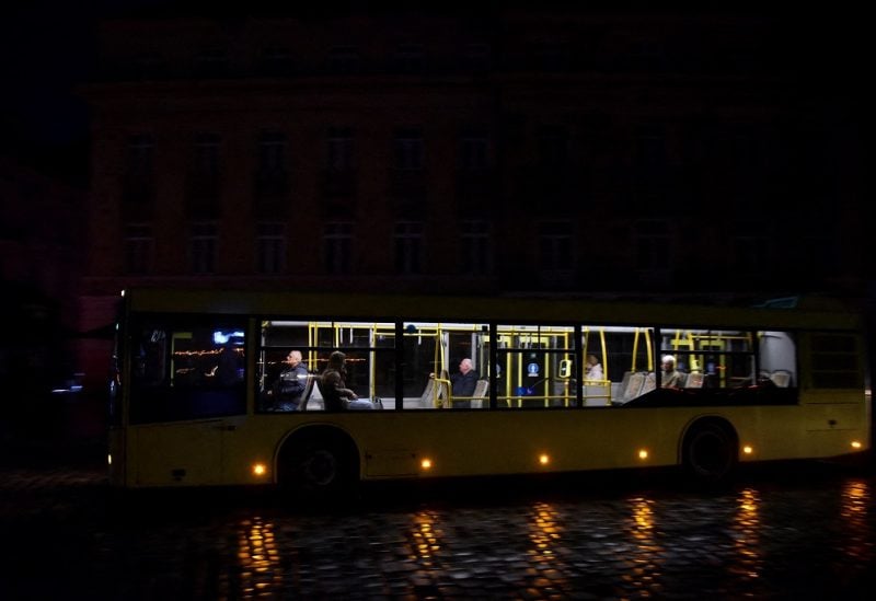 Passengers are seen inside a public bus in the city centre without electricity after critical civil infrastructure was hit by a Russian missile attacks in Lviv, Ukraine October 11, 2022. REUTERS/Pavlo Palamarchuk/File Photo