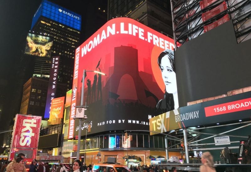 screen shows an image depicting Mahsa Amini during a protest against her death in Iran, on Times Square, New York, U.S., October 27, 2022 in this picture obtained from social media. Soodabeh Saeidnia/via REUTERS