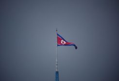 A North Korean flag flutters at the propaganda village of Gijungdong in North Korea, in this picture taken near the truce village of Panmunjom inside the demilitarized zone (DMZ) separating the two Koreas, South Korea, July 19, 2022. REUTERS/Kim Hong-Ji/Pool/File Photo