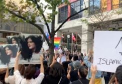 People attend a protest in solidarity with the women in Iran, following the death of Mahsa Amini, in Toronto, Canada, September 19, 2022 in this screen grab obtained from social media video obtained by REUTERS