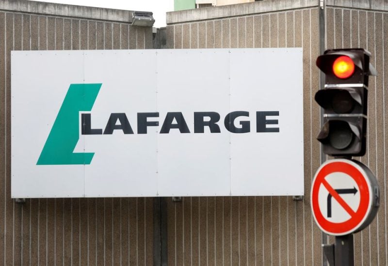 The logo of French concrete maker Lafarge is seen on the plant of Bercy on the banks of the river Seine in Paris, France, September 3, 2020. REUTERS/Charles Platiau