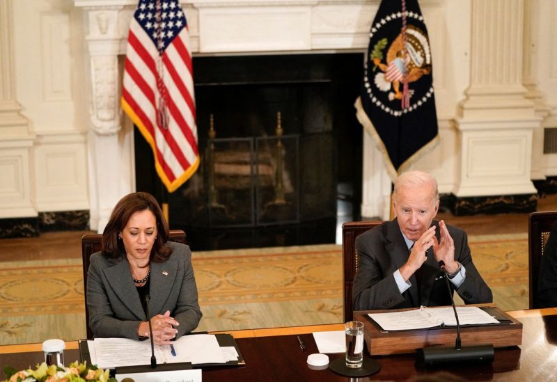 U.S. President Joe Biden and Vice President Kamala Harris attend a meeting of the Reproductive Healthcare Access Task Force in the State Dining Room at the White House in Washington, U.S., October 4, 2022. REUTERS/Elizabeth Frantz