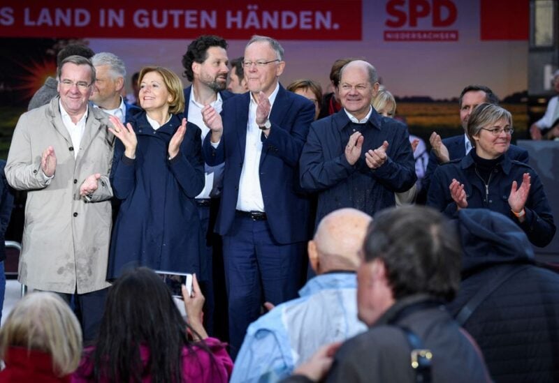 German Chancellor Olaf Scholz, Minister President of Lower Saxony Stephan Weil and Minister President of Rhineland-Palatinate Malu Dreyer attend the final rally ahead of the regional elections in the state of Lower Saxony, in Hanover, Germany October 8, 2022. REUTERS/Fabian Bimmer