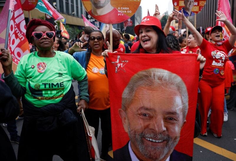 People attend a silent march led by Brazil's former President and presidential candidate Luiz Inacio Lula da Silva, in Sao Paulo, Brazil October 1, 2022. REUTERS