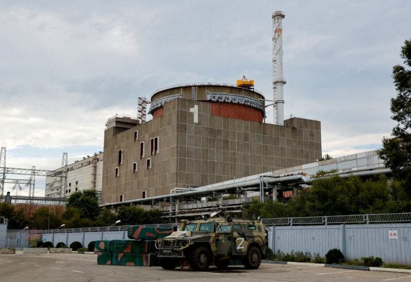 A Russian all-terrain armoured vehicle is parked outside the Zaporizhzhia Nuclear Power Plant